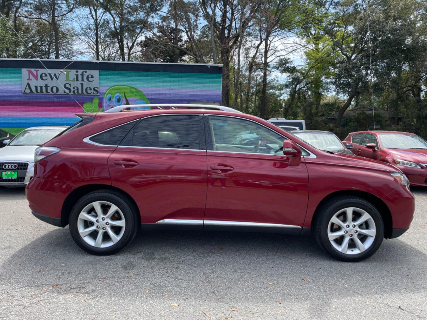 2010 RED LEXUS RX 350 BASE (2T2ZK1BAXAC) with an 3.5L engine, Automatic transmission, located at 5103 Dorchester Rd., Charleston, SC, 29418-5607, (843) 767-1122, 36.245171, -115.228050 - Super clean interior with Leather, Sunroof, 6-disc CD/AUX/Sat, hands-free Phone, Dual Climate Control, Power Everything (windows, locks, seats, mirrors), Heated/Cooled/Memory Seating, Push Button Start, Keyless Entry, Alloy Wheels. Clean CarFax (no accidents reported!) 108k miles Located at New Lif - Photo#7